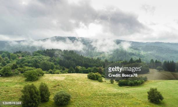 aerial view of farmland in hilly in detva region, slovakia - slovakia stock pictures, royalty-free photos & images