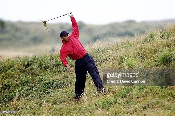 Tiger Woods of the USA plays out of the rough during the British Open at Royal Birkdale Golf Club in Lancashire, England. \ Mandatory Credit: David...