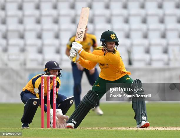 Ben Duckett of Notts Outlaws plays a shot as Yorkshire Vikings wicket keeper Jonathan Tattersall looks on during the T20 Vitality Blast 2020 match...