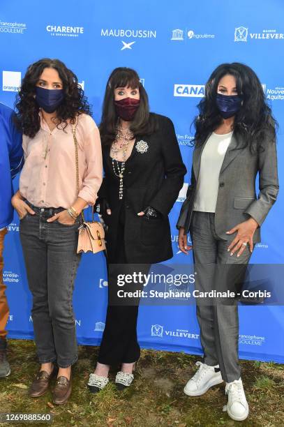 Actresses Rachida Brakni, Isabelle Adjani and director Yamina Benguigui attend the "Soeurs" Photocall at 13th Angouleme French-Speaking Film Festival...