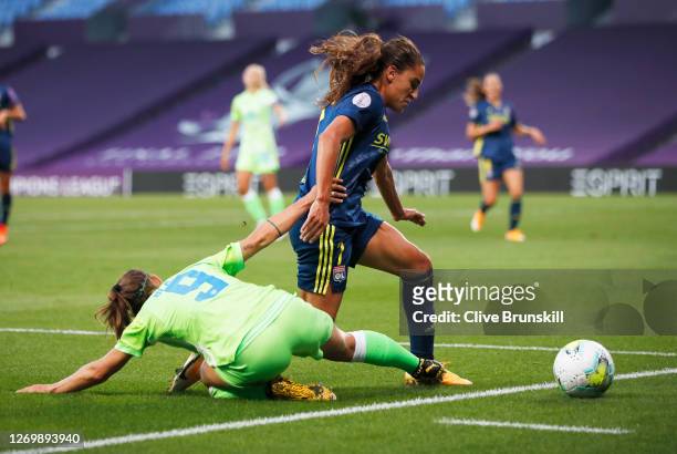 VfL Wolfsburg's Anna Blaesse tackles Olympique Lyon's Amel Majri during the UEFA Women's Champions League Final between VfL Wolfsburg Women's and...