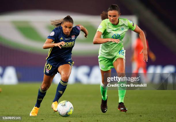 Delphine Cascarino of Olympique Lyon is challenged by Ewa Pajor of VfL Wolfsburg during the UEFA Women's Champions League Final between VfL Wolfsburg...