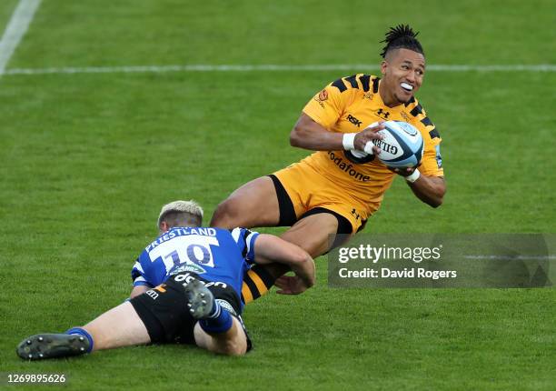 Marcus Watson of Wasps is tackled by Rhys Priestland during the Gallagher Premiership Rugby match between Bath Rugby and Wasps at the Recreation...