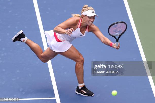 Angelique Kerber of Germany returns a shot during her Women's Singles first round match against Ajla Tomljanovic of Australia on Day One of the 2020...