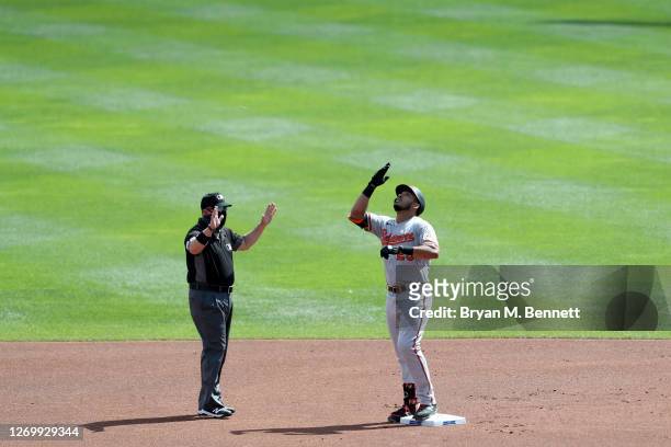 Anthony Santander of the Baltimore Orioles celebrates after hitting a double during the first inning against the Toronto Blue Jays at Sahlen Field on...