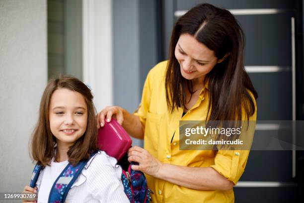 mother packing lunch for school - lunch bag stock pictures, royalty-free photos & images