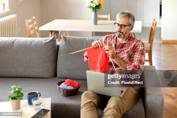 knitting at home - man knitting stock pictures, royalty-free photos & images