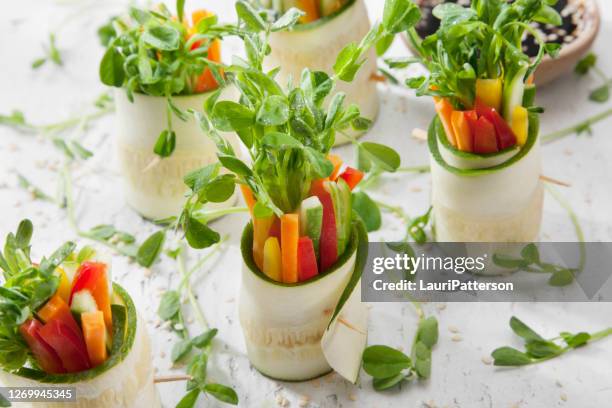 zucchini salad rolls - sushi wrap stock pictures, royalty-free photos & images