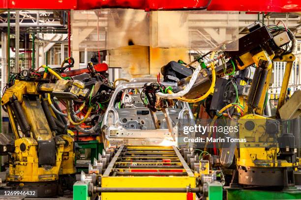 car factory production line - car assembly line control stock pictures, royalty-free photos & images