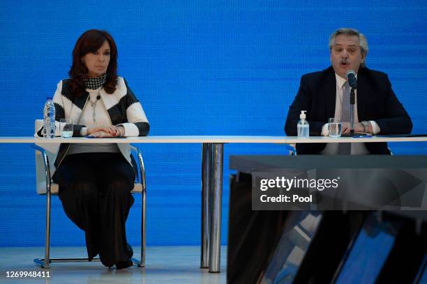 President of Argentina Alberto Fernandez speaks during a press conference while sitting next to Vice President of Argentian Cristina Fernandez de...