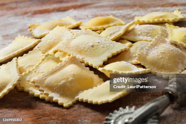 fresh made cheese ravioli - ravioli stock pictures, royalty-free photos & images