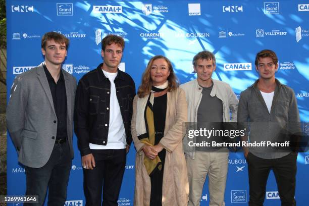 Actors Edouard Sulpice, Yoann Zimmer, Catherine Frot, director Lucas Belvaux and actor Felix Kysyl attend the "Des Hommes" Photocall at 13th...