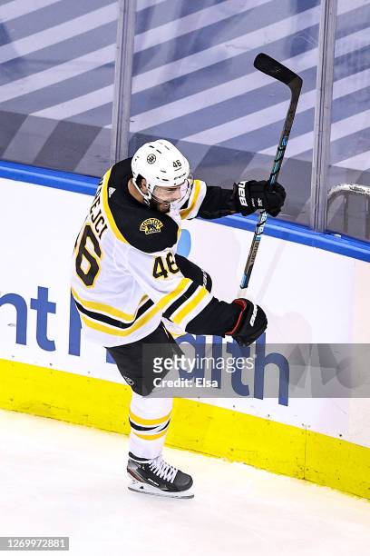 David Krejci of the Boston Bruins celebrates after scoring a goal against the Tampa Bay Lightning during the third period in Game Five of the Eastern...