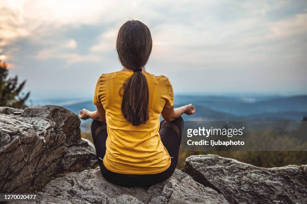 breathe in and hold - yoga germany stock pictures, royalty-free photos & images