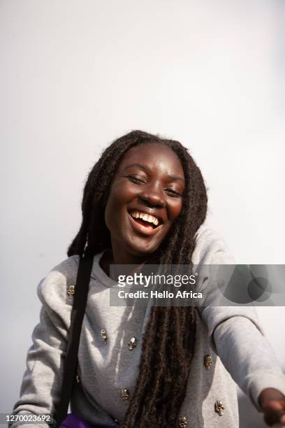 a beautifully happy young woman - happy people africa stockfoto's en -beelden