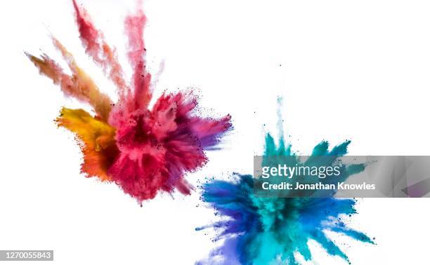 vibrant exploding powders - esplodere foto e immagini stock