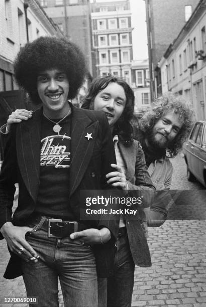 From left to right, singer Phil Lynott, drummer Brian Downey and guitarist Eric Bell of rock band Thin Lizzy, UK, 23rd February 1973.