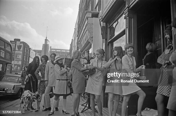 Singer Cilla Black and broadcaster Cathy McGowan among others arrive at the new Biba boutique on Kensington Church Street, London, near the junction...