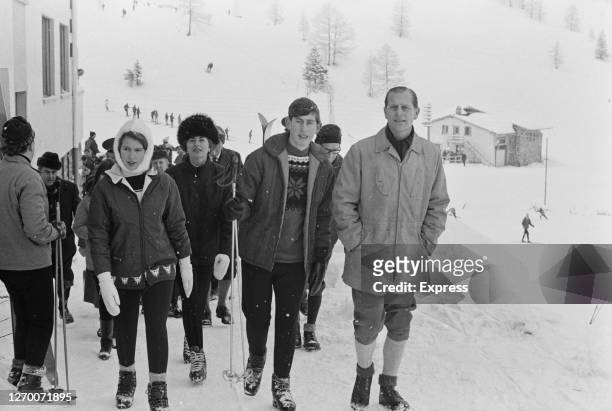 Princess Anne, Prince Charles and Prince Philip, Duke of Edinburgh, during a skiing holiday in Liechtenstein, December 1965.