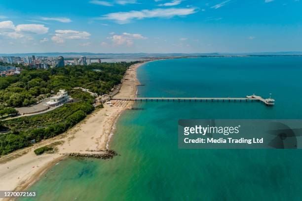 aerial shot of pier next to sea garden in burgas, bulgaria - (bulgarian: морска градина, бургас, българия) - burgas bulgaria stock pictures, royalty-free photos & images
