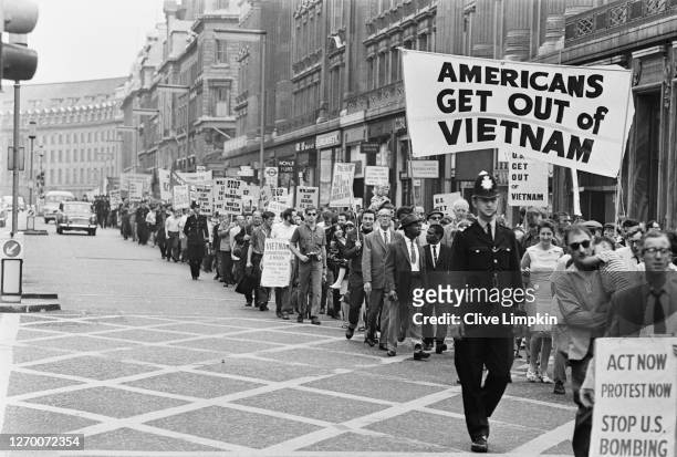 An anti-Vietnam War demonstration on Regent Street in London, 3rd July 1966. They are marching to the US Embassy on Grosvenor Square.