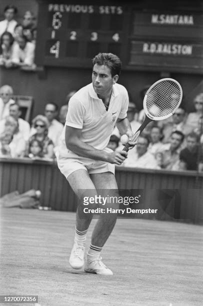 Spanish tennis player Manuel Santana defeats Dennis Ralston in the finals to win the Men's Singles title at the Wimbledon Championships, London, UK,...