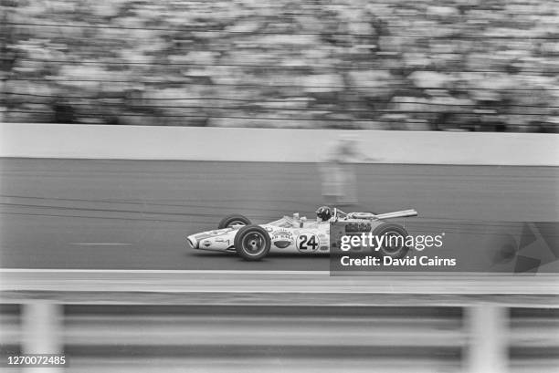 British racing driver Graham Hill driving a Lola-Ford to victory at the Indianapolis 500, Indiana, USA, 30th May 1966.