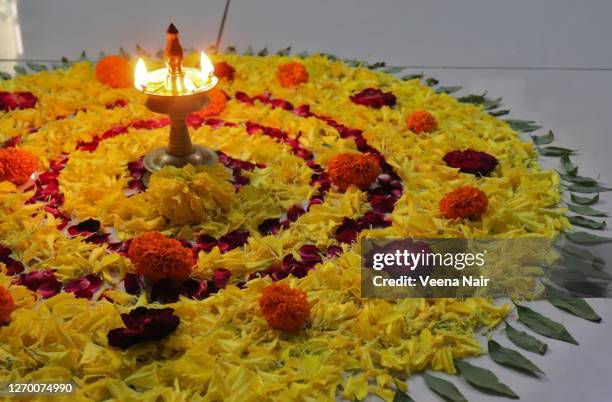 onam pookalam/onam celebration/floral pattern-kerala festival - pookalam stock pictures, royalty-free photos & images