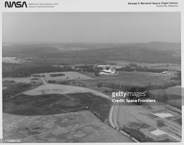 Space Shuttle Enterprise arrives atop NASA 905, a 747 carrier aircraft, at Redstone Arsenal Airfield near Huntsville, Alabama, 13th March 1978....