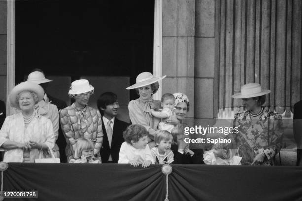 The royal family gather on the balcony of Buckingham Palace in London for the Trooping the Colour ceremony, 15th June 1985. Among them are Queen...