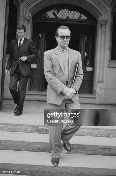 English lyricist Bernie Taupin at the High Court in London, UK, 4th June 1985. He and his musical collaborator Elton John are suing their former...