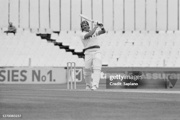 English cricketer Ian Botham of Somerset CCC during a match against Surrey, UK, 22nd June 1985.