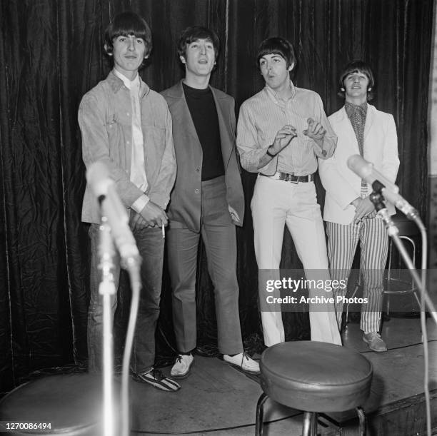 English rock group the Beatles hold a press conference at the Capitol Records Tower in Los Angeles before their live performance at the Dodger...