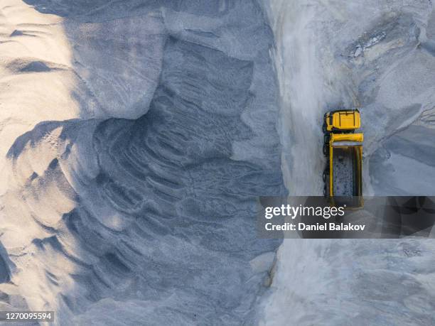 building new highways in the mountain. aerial view directly above over a highway construction site in the mountains, top view, cityscape. global business, construction, transport and industry. - mining from above stock pictures, royalty-free photos & images