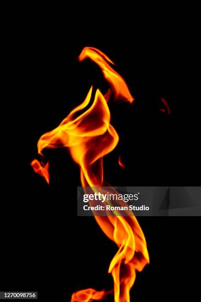 fire flames on black background. - campfire art stock pictures, royalty-free photos & images