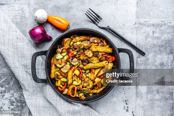 pan with vegetables and vegetarian chicken liver - homemade meal stock pictures, royalty-free photos & images