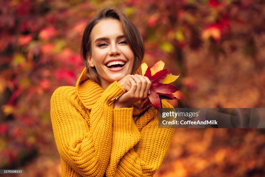 Autumn photo of a beautiful girl