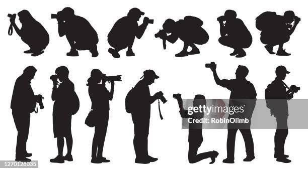 photographer silhouettes - camera stand stock illustrations