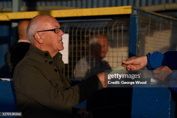 Spectator is handed a raffle ticket during the FA Cup Extra Preliminary Round between Eccleshill United and Silsden on September 01, 2020 in...