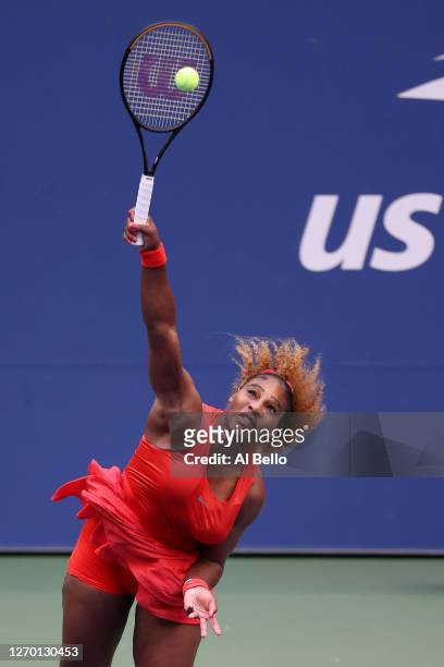 Serena Williams of the United States serves the ball during her Women's Singles first round match against Kristie Ahn of the United States on Day Two...