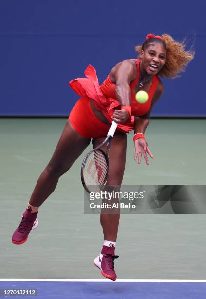 Serena Williams of the United States serves the ball during her Women's Singles first round match against Kristie Ahn of the United States on Day Two...