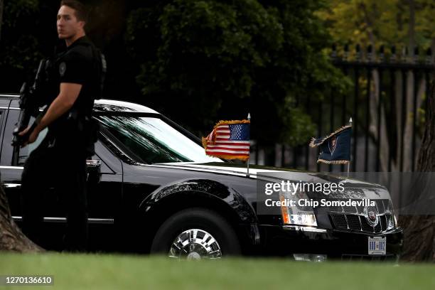 The presidential limousine, also called 'The Beast,' arrives back at the White House with U.S. President Donald Trump, following his trip to...