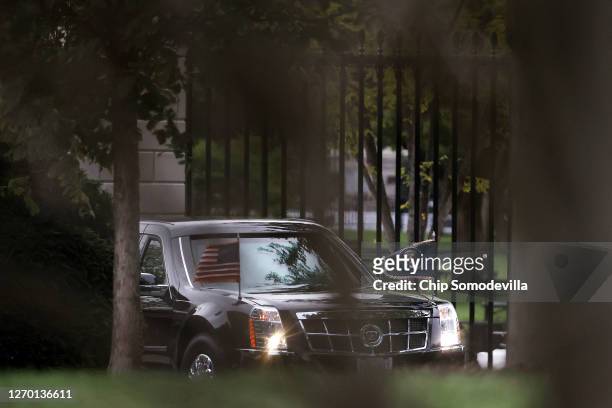 The presidential limousine, also called 'The Beast,' arrives back at the White House with U.S. President Donald Trump, following his trip to...