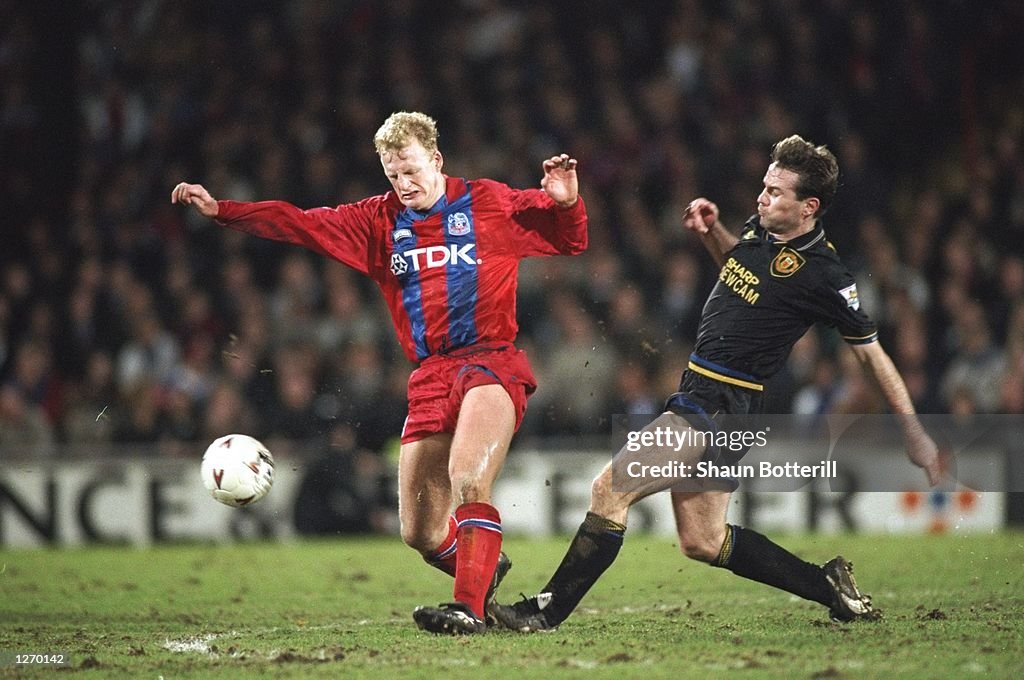 Ian Dowie of Crystal Palace and Brian McClair of Manchester United