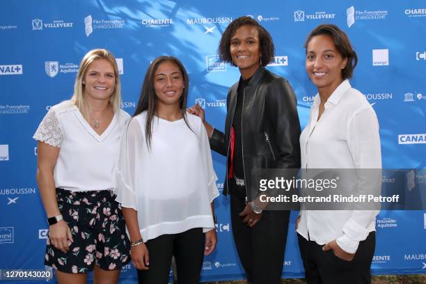 Football players Eugenie Le Sommer, Sarah Bouhaddi, Wendie Renard and Selma Bacha attends the "Les Joueuses" Photocall at 13th Angouleme...