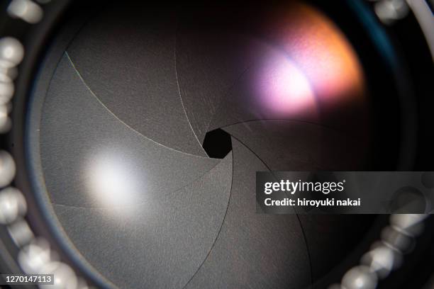 diaphragm blade of lens of camera - vision films stock pictures, royalty-free photos & images