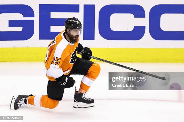 Matt Niskanen of the Philadelphia Flyers celebrates after scoring a goal against the New York Islanders during the third period in Game Five of the...