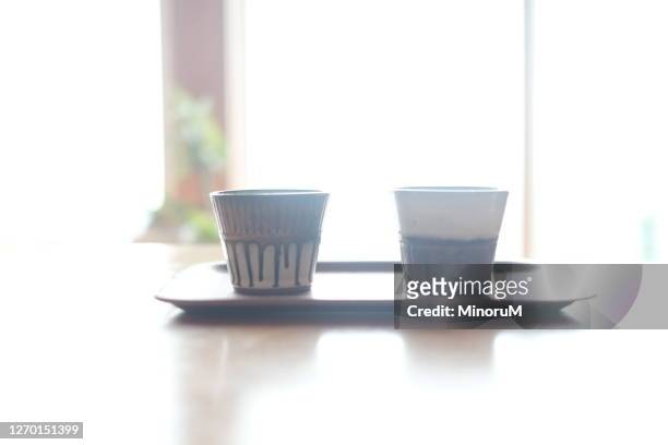 pair of close up coffee cups - things that go together stock pictures, royalty-free photos & images