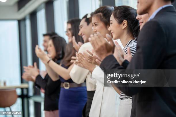 congratulation. business event conference. business people clapping their hands at the meeting. business people clapping their hands, congratulation and appreciation concepts - work respect stock pictures, royalty-free photos & images