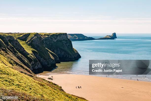 view over the beach in rhossili bay - gower peninsula stock pictures, royalty-free photos & images